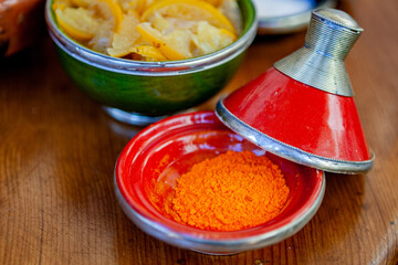 Moroccan tumeric in tajine and pickled lemons in the background, Marrakesh, Morocco, West Africa, Africa.