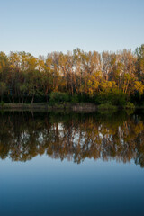 sandy birch of the Ural river in the sunset