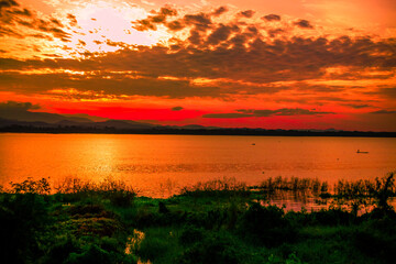 The background of the bridge stretches into the sea, with twilight light in the morning, beautiful colors, sky wallpaper and refreshing surroundings.