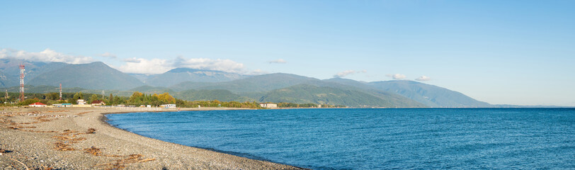Panoramic view of state border between Russia and Abkhazia, passing along the rocky beach of Adler town. The Black Sea coast of Sochi.