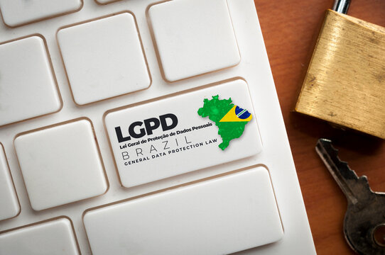LGPD: a white keyboard with a key with text Lei Geral de Proteção de Dados Pessoais. This law regulate data protection and privacy in Brazil