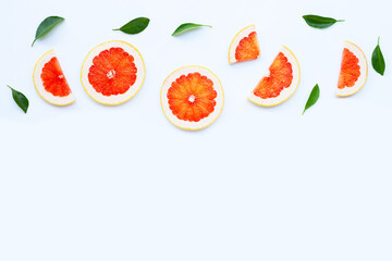 High vitamin C. Juicy grapefruit slices on white.