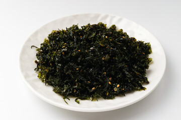 Seasoned seaweed on white background