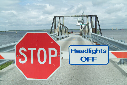 Stop sign at a ferry crossing, USA.
