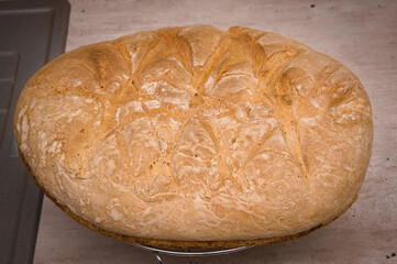 homemade bread on a metal rack