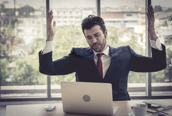 Stressed business man  in his office