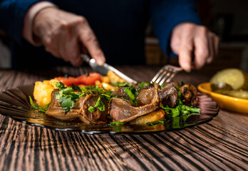 Stewed potatoes with chicken stomach with pickled cucumbers