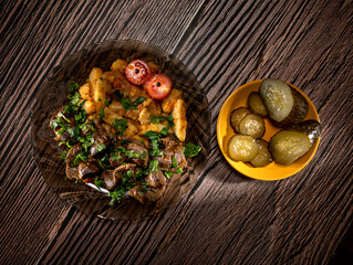 Stewed potatoes with chicken stomach with pickled cucumbers