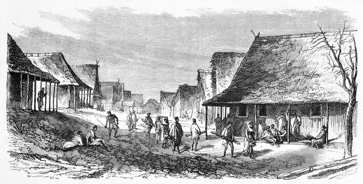 Everyday life in a small village with huts in Tamatave, Madagascar. Ancient grey tone etching style art by B�rard, Le Tour du Monde, 1861