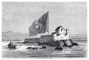 Flag waving on the little fortress built on small island entering in Vitoria seaport, state of Espirito Santo, Brazil. Ancient grey tone etching style art by Maurand, Le Tour du Monde, 1861