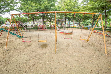 Old empty playground with metal structures