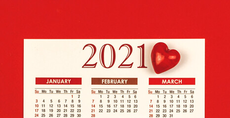 Valentine's Day 2021 calendar design on red background with heart, template or mockup concept