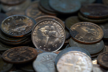 Klang Selangor, Malaysia - January 9,2021 : Selective focus on rusty Malaysian coins for the year 2006.