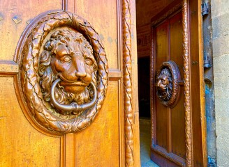 old wooden door to the town hall in Aix en Provence