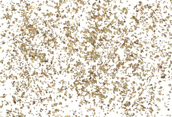 Dried and chopped basil spice pile isolated on white background, top view pattern