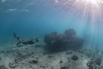 Snorkeling at wreck site World War 2 tank 