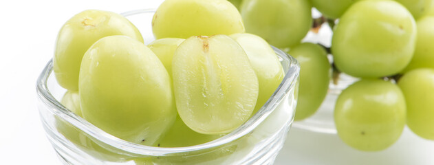 Beautiful boxed Shine Muscat green grape isolated on white background.