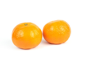 Fresh tangerines on white background