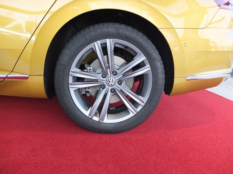 Jõhvi, Estonia 5.04.2018 - Car Showroom.  Aluminum wheel with Continental ContiEcoContact 245/55/R18 Tire. Wolksvagen logo.
