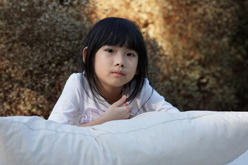 Portrait Asian Thailand kids cute little girl In white dress	