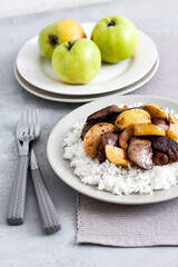 Fried chicken liver with apples and onions