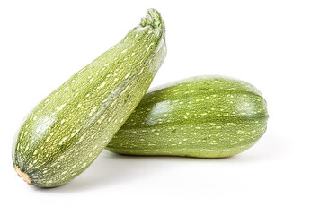 Young fresh raw zucchini from the squash family of green color on a white isolated background in a photography studio. Healthy vegetarian food, summer vegetable at eco markets and farmers markets.