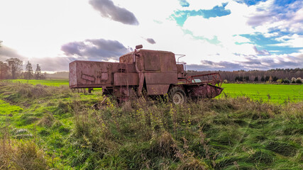 Abandoned harvester in the middle of the field