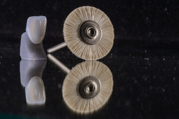 Isolated dental tools with a dental crown.
