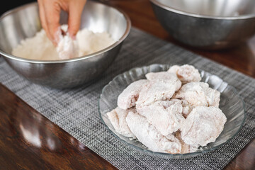 Raw chicken with flour