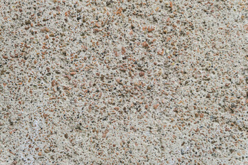 Texture of the weathered surface of a monolithic wall made of expanded clay concrete