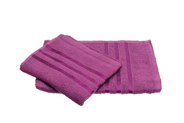 stack of purple towels isolated on white.