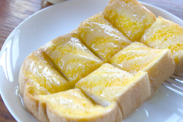 Bread toast with butter sugar and condensed milk
