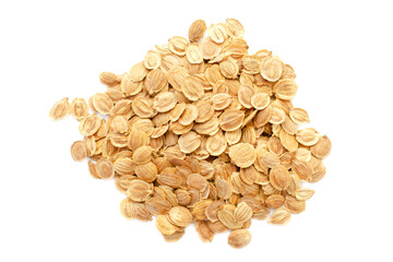 Pile of parsnip seeds isolated on white background, top view. Seeds of the vegetable plant are parsnip. Heap dry parsnip seeds isolated on white background, top view. Vegetable seeds, parsnip.