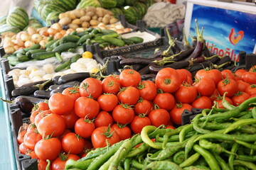 Fototapeta na wymiar Variety of Vegetable at farmer market counter: colorful various fresh organic healthy vegetables at grocery store. Healthy natural food concept