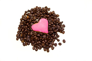 Coffee beans with a heart-shaped biscuit. white background.