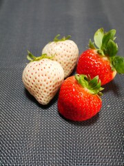 White strawberries and red strawberries