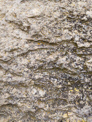 Rough gray stone background. Natural ultimate grey rock texture.