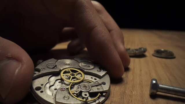 Mechanical watch repair with special tools, watchmaker's workshop
