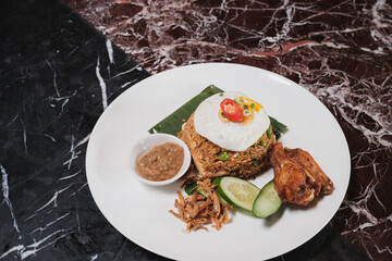 A plate of fried rice in a restaurant
