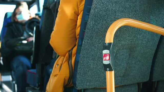 Stop button on the rail of the bus in motion. Emergency stop for passenger when pressed. The railing is the place of transmission Camera movement.
