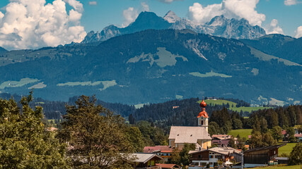 Beautiful alpine summer view with a church at the famous Astberg summit, Going, Wilder Kaiser, Tyrol, Austria