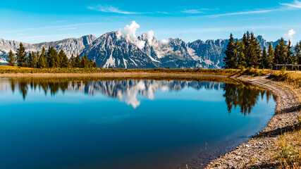Obraz na płótnie Canvas Beautiful alpine summer view with reflections in a lake at the famous Hartkaiser summit, Ellmau, Wilder Kaiser, Tyrol, Austria