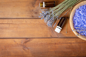 Obraz premium bowl of lavender bath salt and massage oil