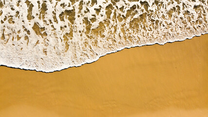 Aerial drone view of the atlantic ocean and beach in the canary islands