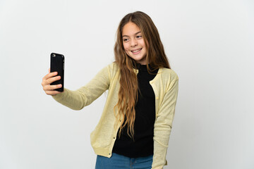 Little girl over isolated white background making a selfie