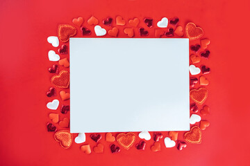 Valentine day, Wedding romantic greeting card background. Red hearts on red background, top view frame