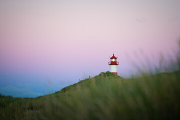 Lighthouse on Sylt island Germany during colorful cloudless sunset no. 1