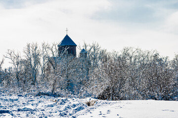 Spacious snow landscape. River and hills in Russia, white winter on the terrain, a lot of fluffy snow and ice