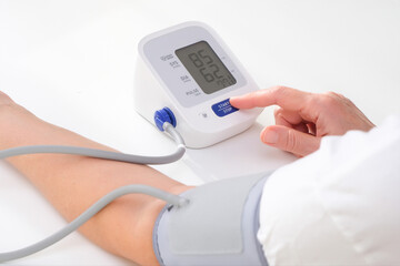 Man measures blood pressure