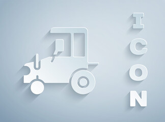 Paper cut Tractor icon isolated on grey background. Paper art style. Vector.